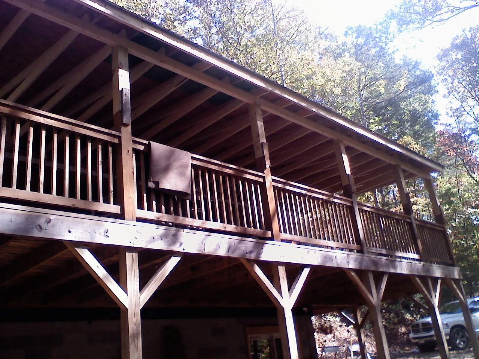 Timber framing under a new elevated porch and deck — Roof Leak Repair in Silverthorne by Roofing Brothers